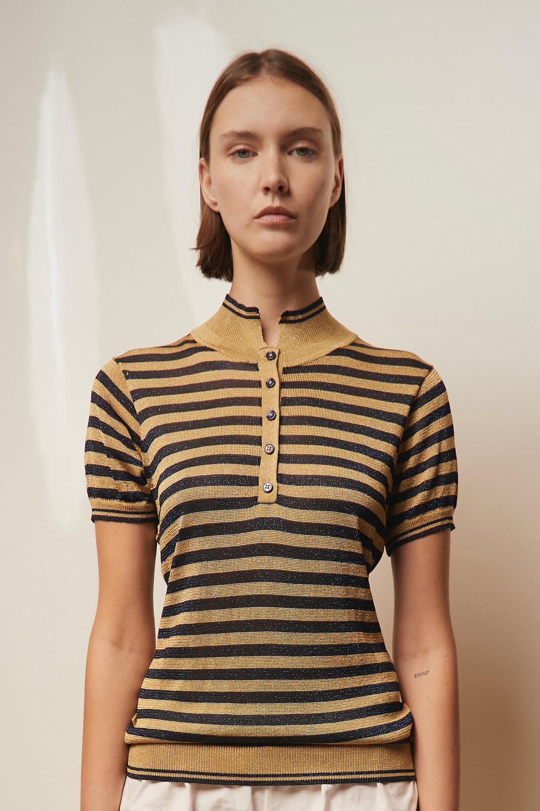 Striped metallic knit polo