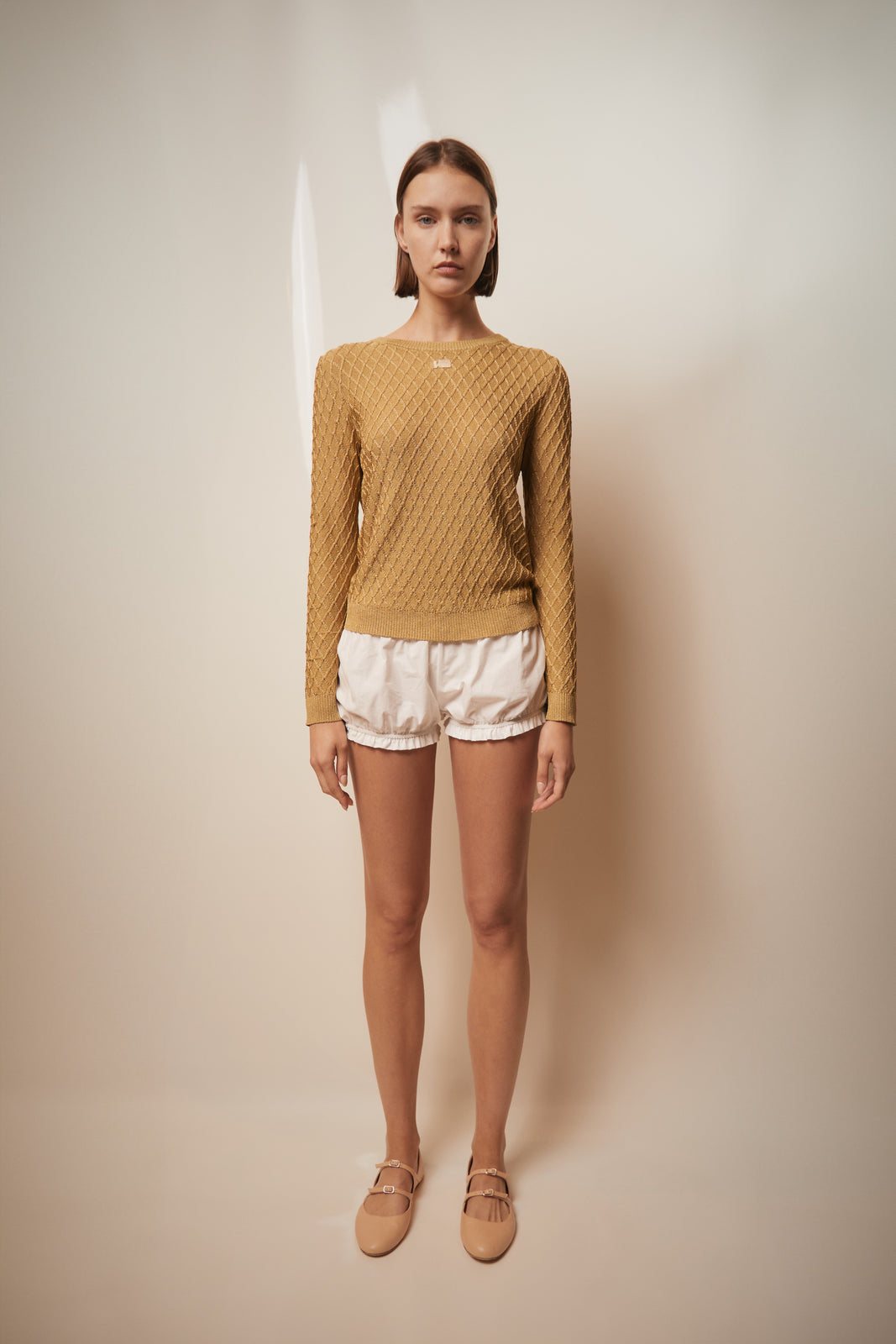 Golden metallic knit jersey