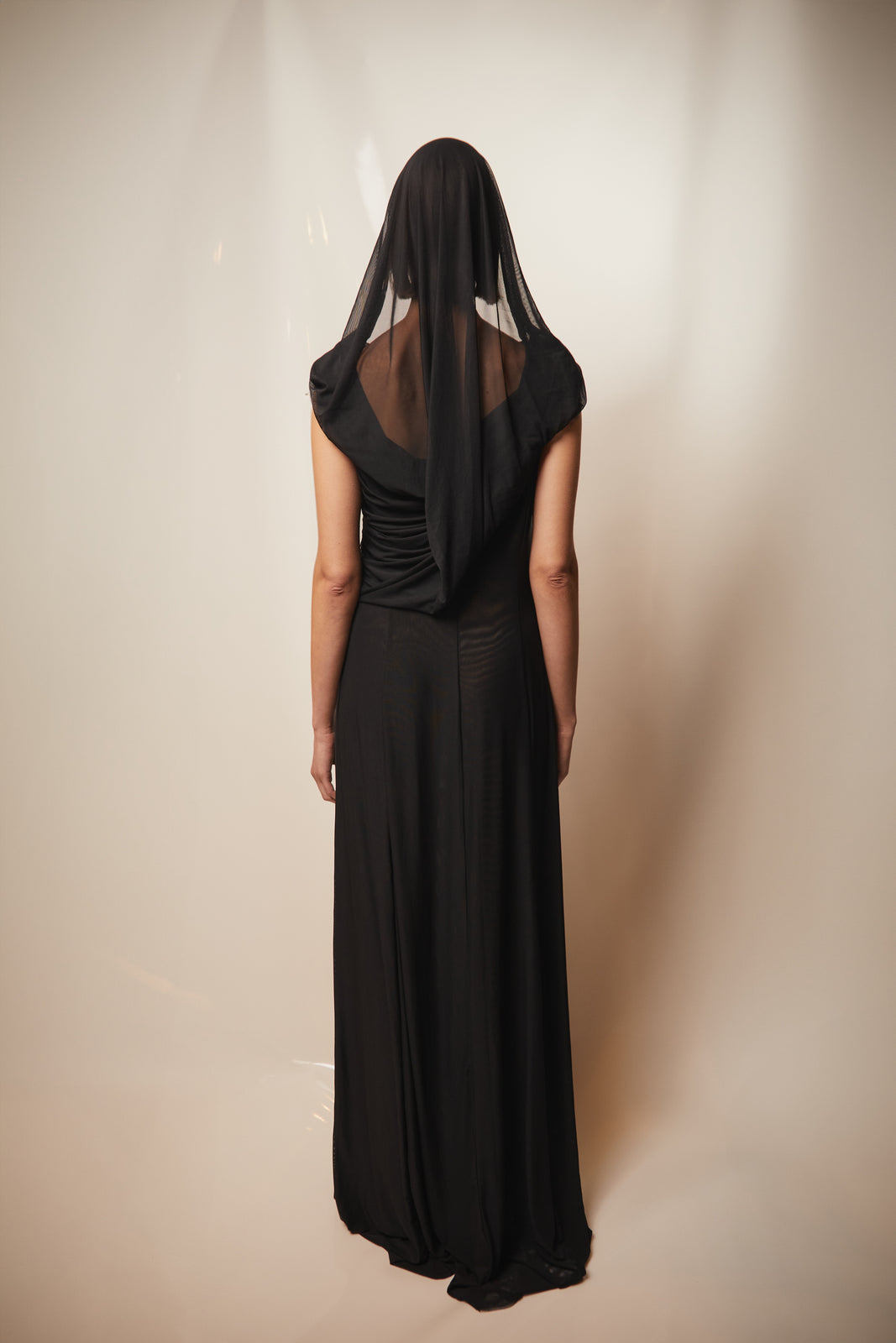 Draped black hooded dress